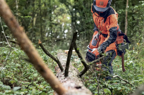 Person chopping with a chainsaw